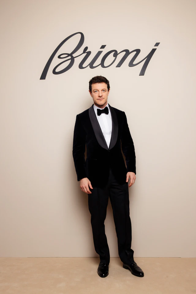 ブリオーニ、ミラノのFondazione Cariploで開かれたプライベートディナーで2026年秋冬メンズコレクションを祝う