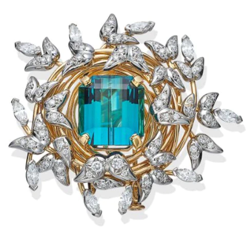 パトリック・ブランマールの着用ジュエリー　Jean Schlumberger by Tiffany Nest Brooch in Yellow Gold and Platinum with a Blue Tourmaline and Diamonds
